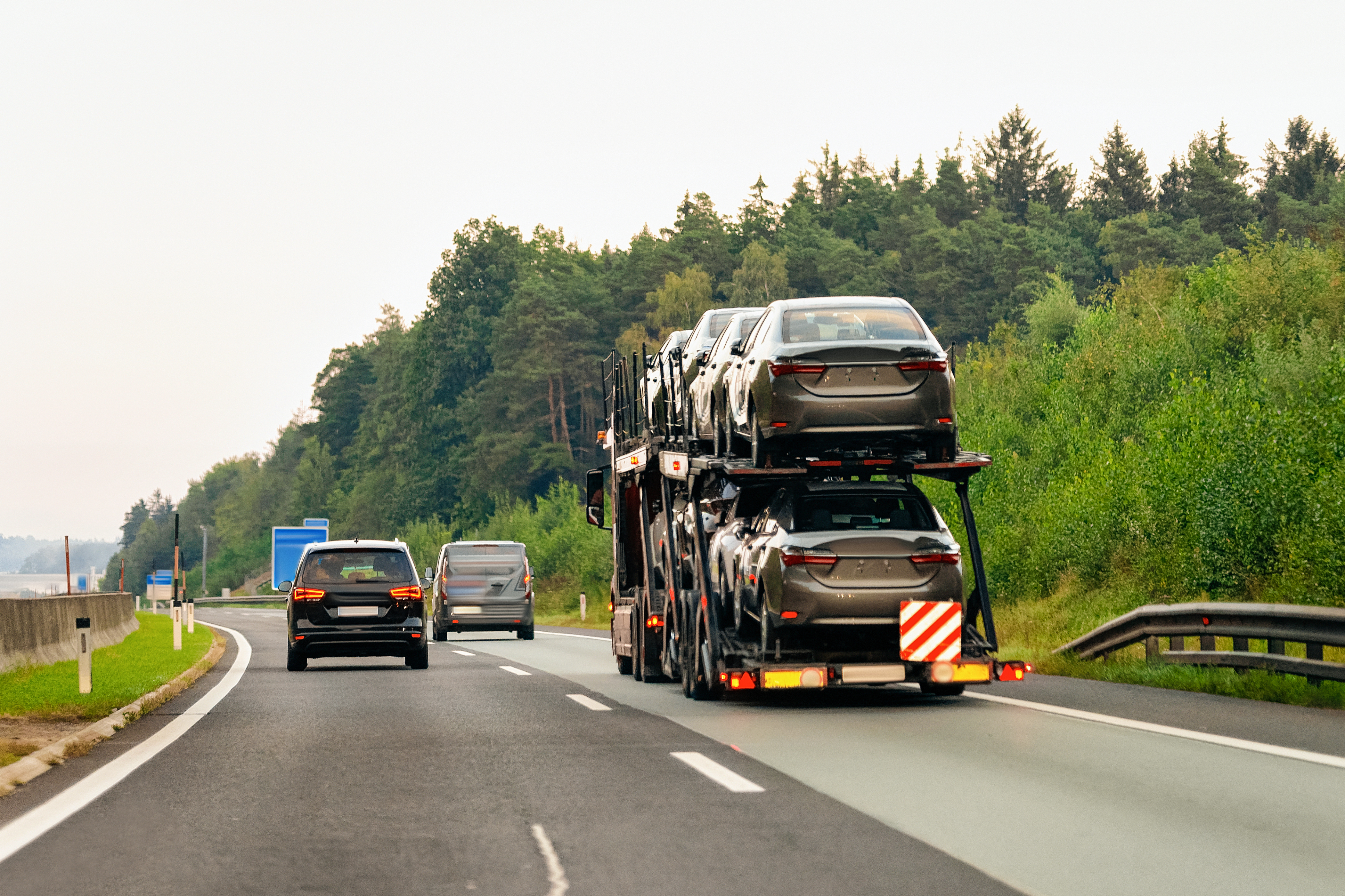 Cars carrier truck in asphalt highway road in Poland
